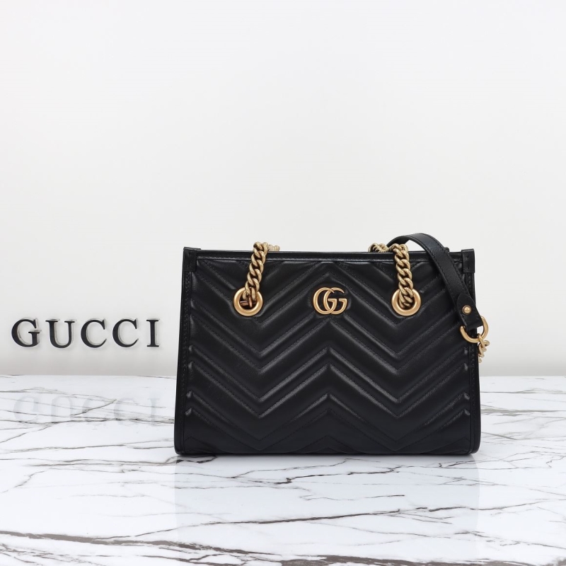 G*u*i shopping bags